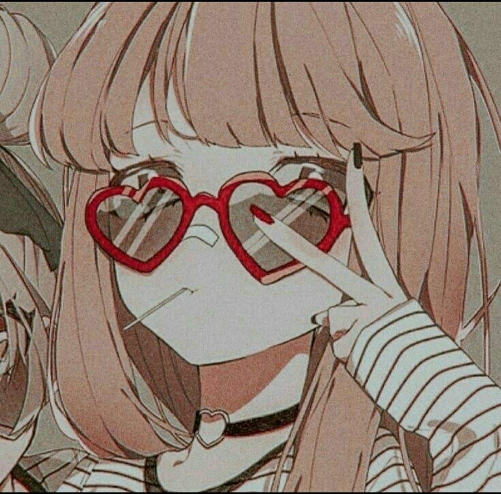 menina de oculos e palito de dente na boca